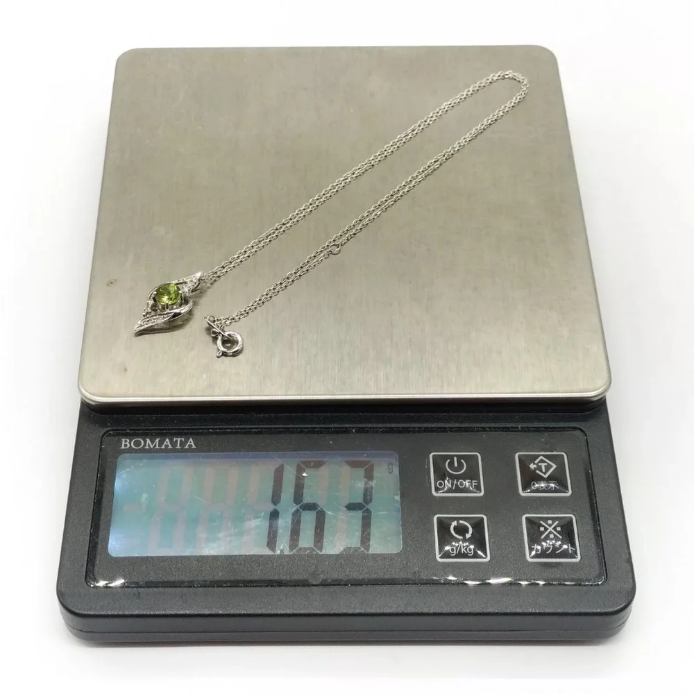 Stunning Peridot with Diamonds and white gold chain - Picture 11 of 12